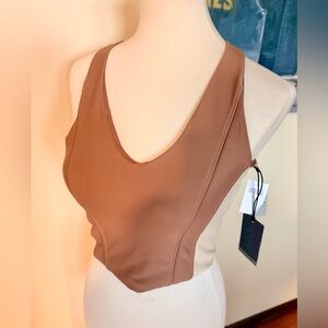 YBP Curve Life active wear compression top.size M
NWT’s